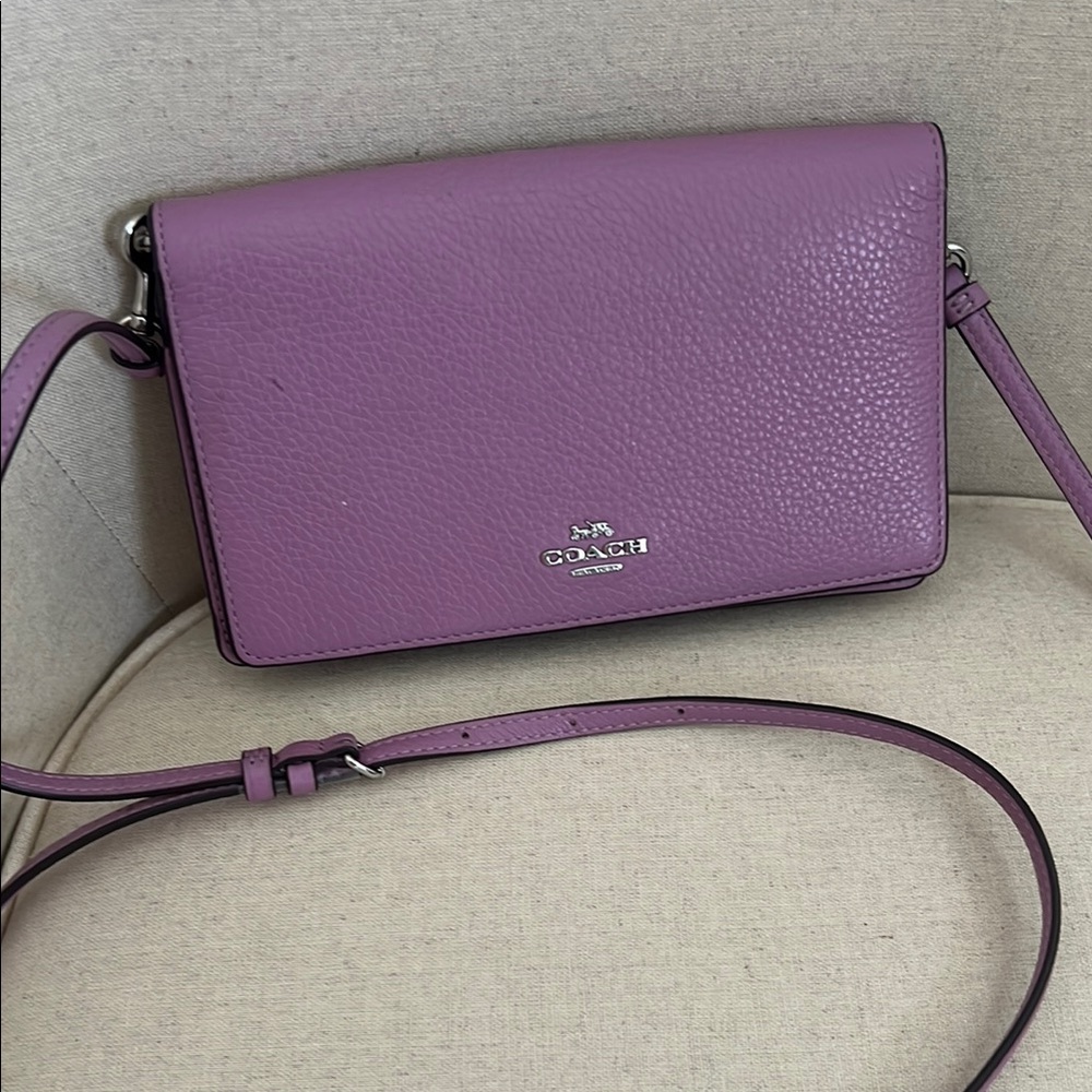 Coach Purple Pebbled Leather Crossbody Bag with Flap Closure